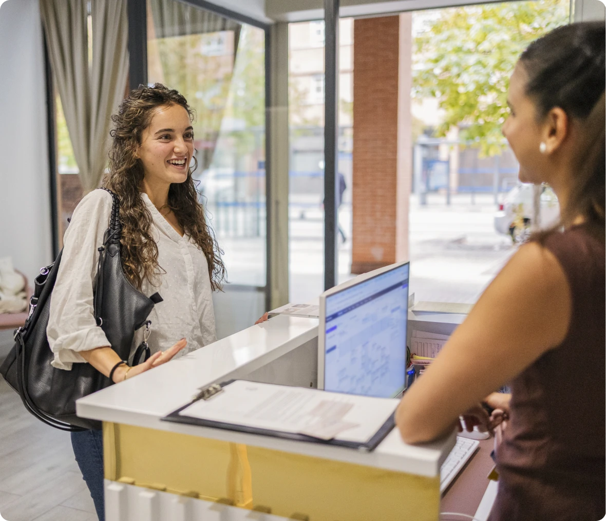Friendly interaction at reception desk