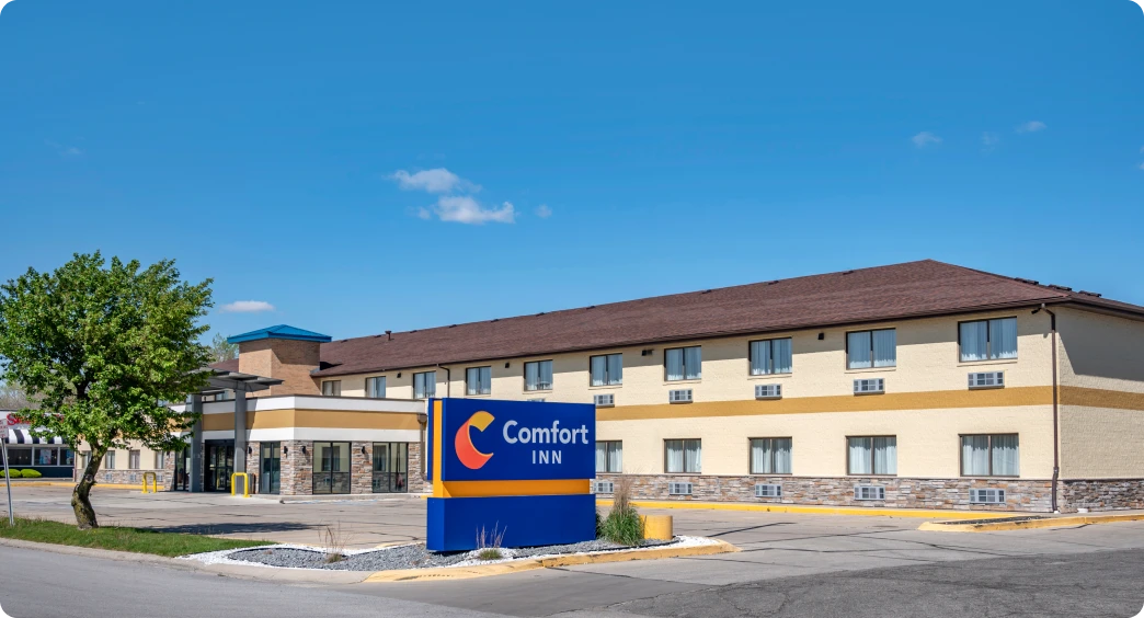 Two-story hotel with parking lot